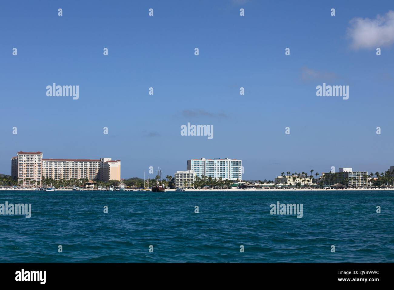 PALM BEACH, ARUBA - OCTOBER 17, 2021: View from the sea of the Marriott and Radisson Blu hotels and the Holiday Inn Resort along Palm Beach, Aruba Stock Photo