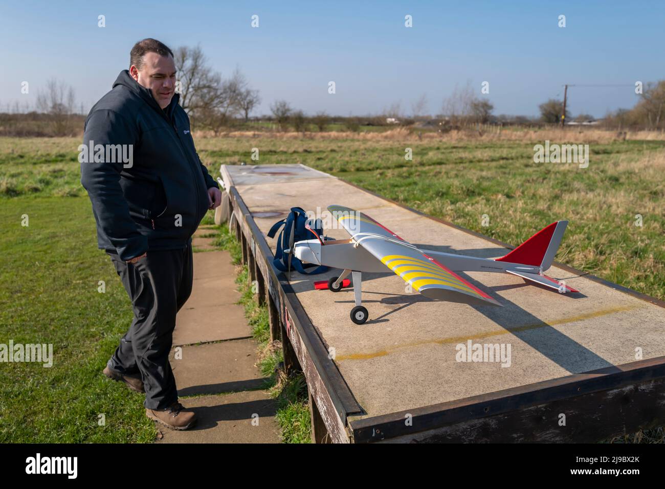 A radio controlled plane with the pilot. Stock Photo