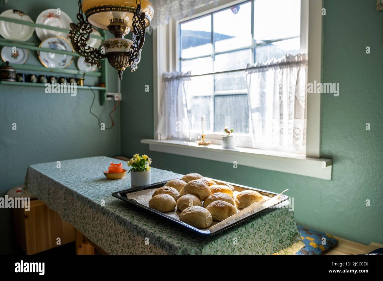 Baking buns in a traditional Faroe Islands guesthouse. Stock Photo