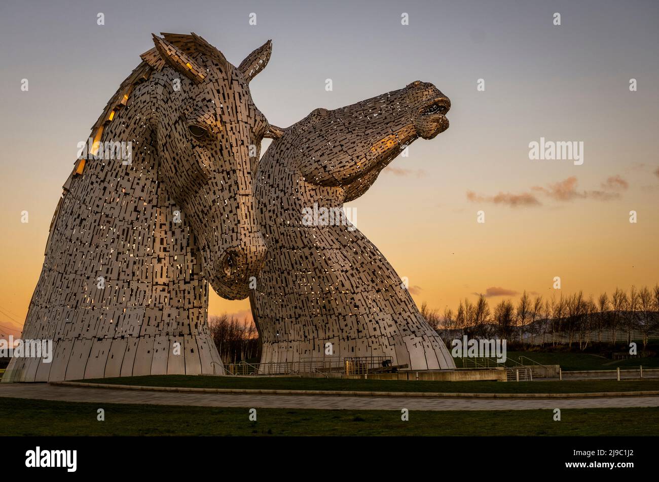 The beautiful sculptures of the Kelpies in Falkirk during sunrise. Stock Photo