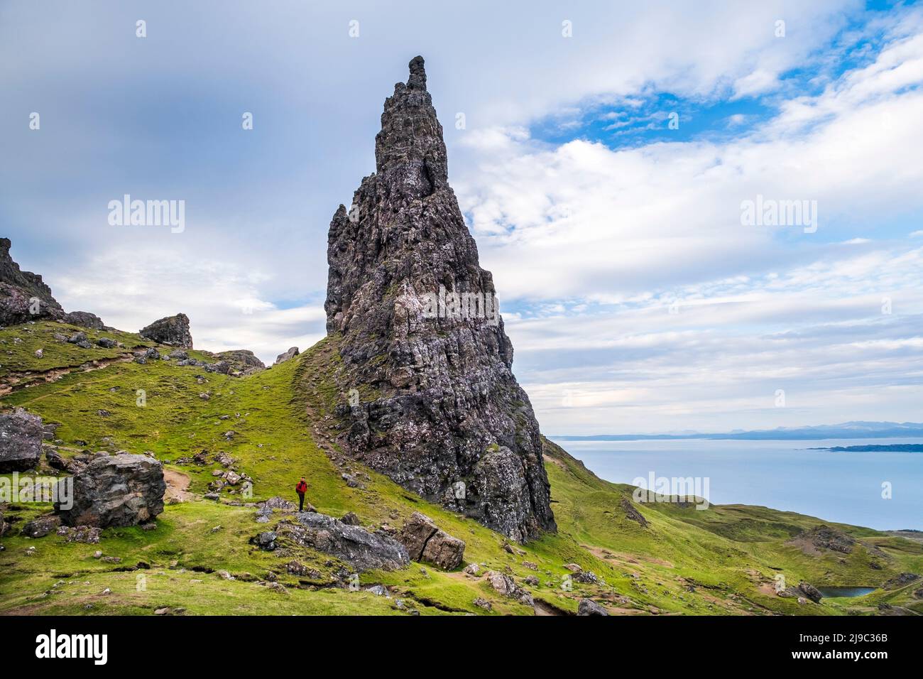 This majestic dramatic rock formation points high into the sky. Stock Photo