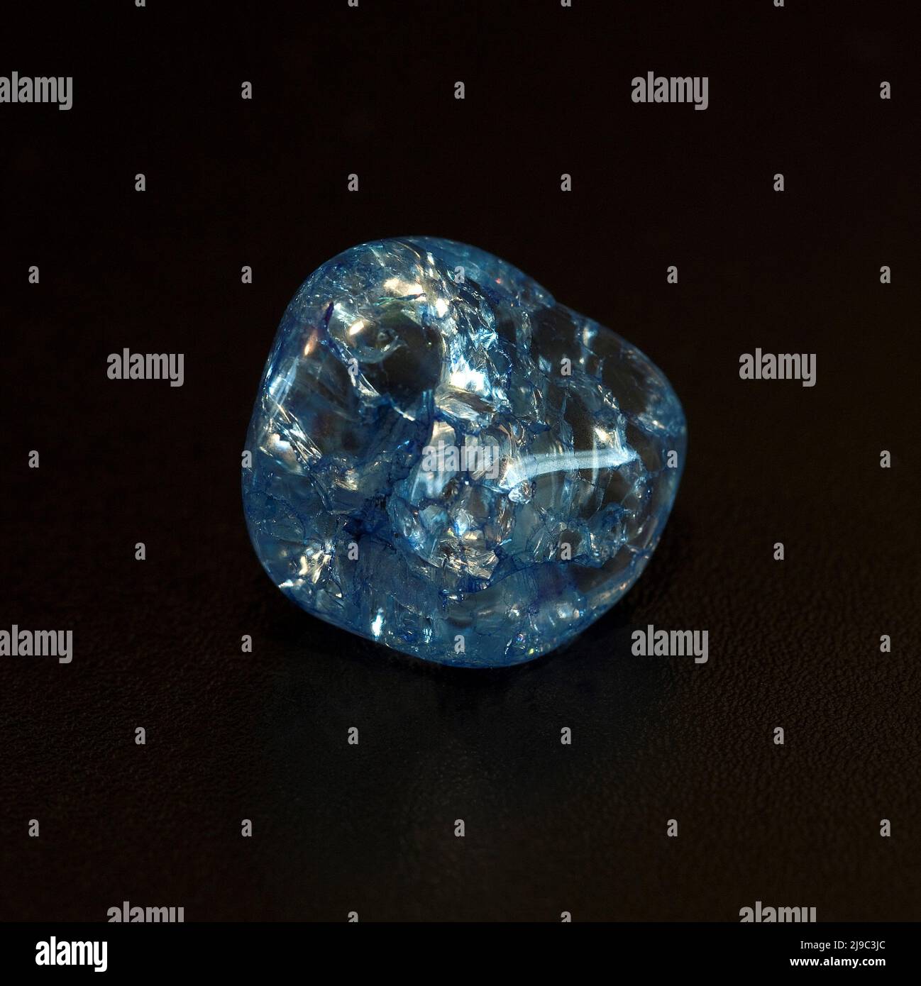 Macro close up colour photograph of 'Blue Crackle Quartz' a semi