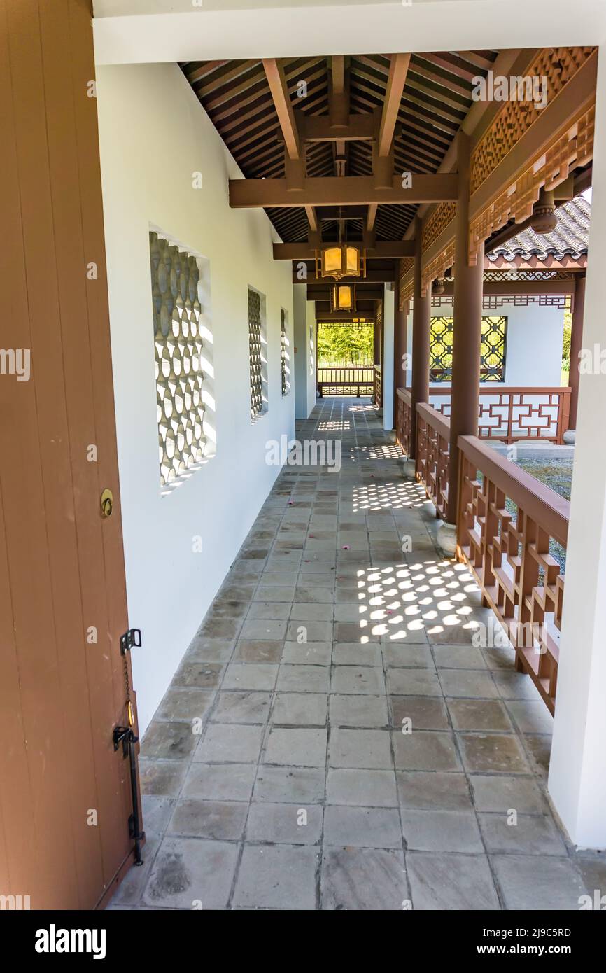 A View Of A Corridor Of A Building At A Chinese Garden In South Seattle a-view-of-a-corridor-of-a-building-at-a-chinese-garden-in-south-seattle