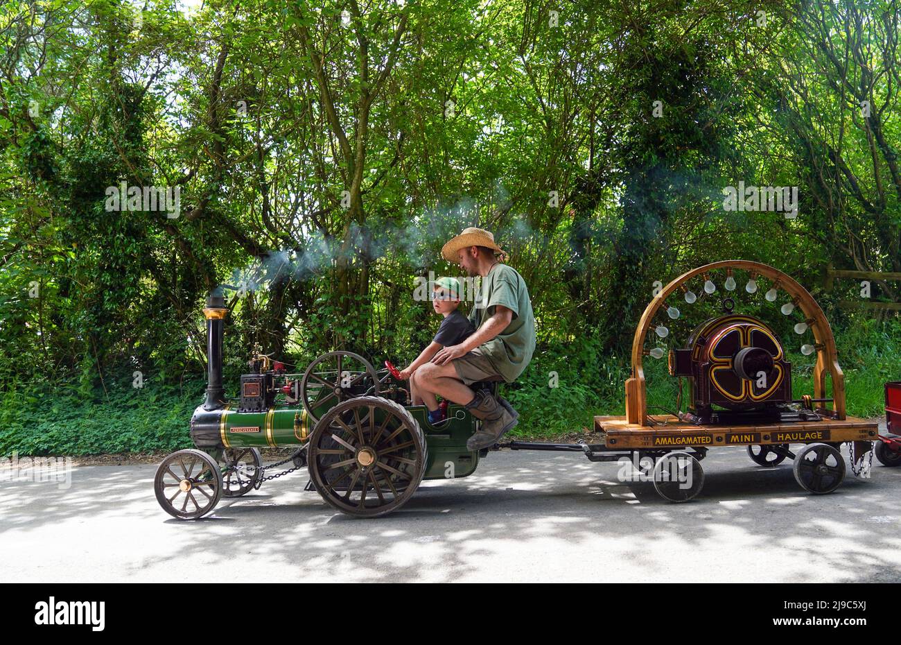 Alf Howick with his son Tobias drives his Burrell traction engine called Perseverance during the Vintage Vehicles weekend at the Mid Hants Railway, also known as the Watercress Line in Ropley, Hampshire. Picture date: Sunday May 22, 2022. Stock Photo