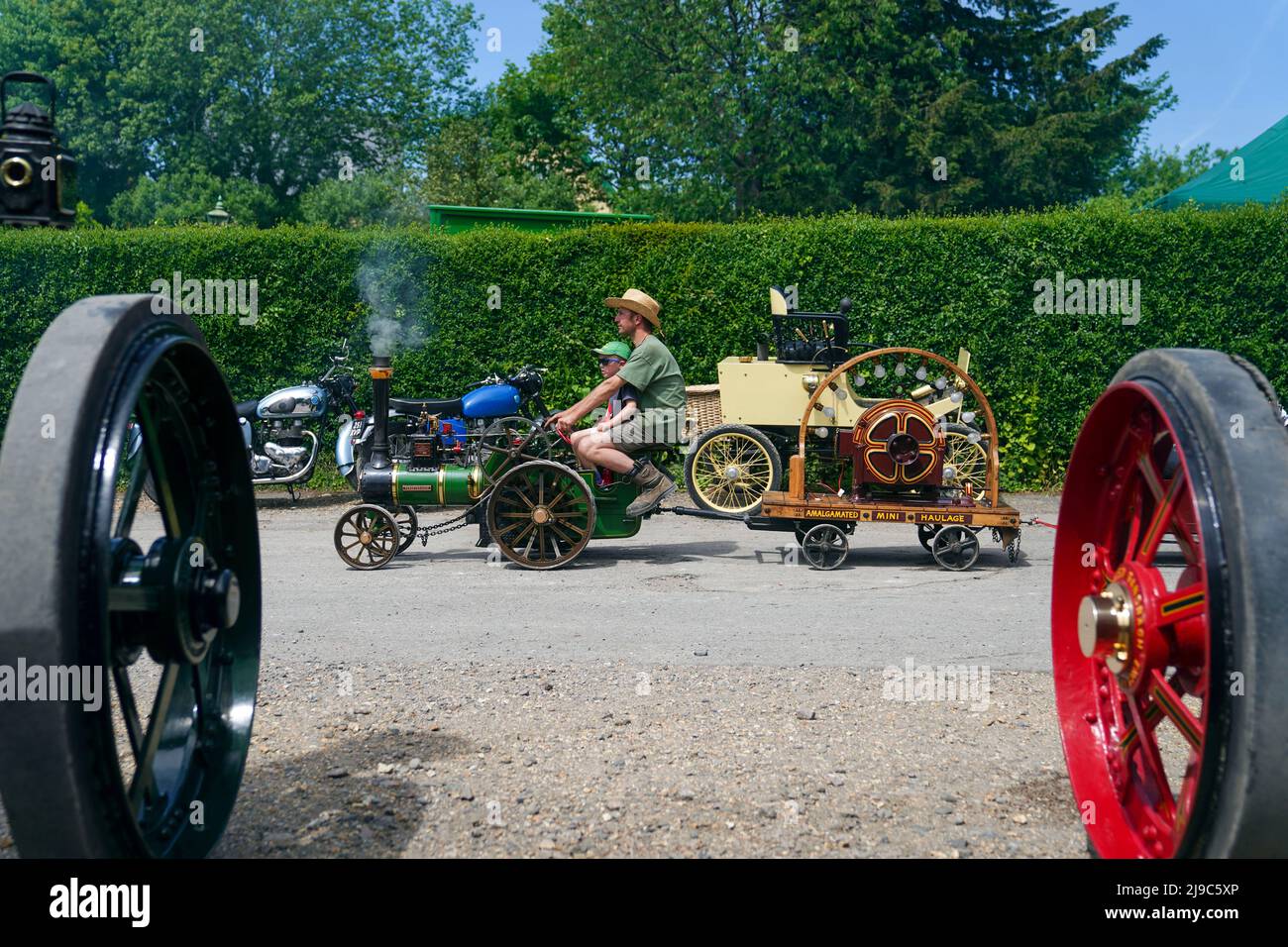 Alf Howick with his son Tobias drives his Burrell traction engine called Perseverance during the Vintage Vehicles weekend at the Mid Hants Railway, also known as the Watercress Line in Ropley, Hampshire. Picture date: Sunday May 22, 2022. Stock Photo