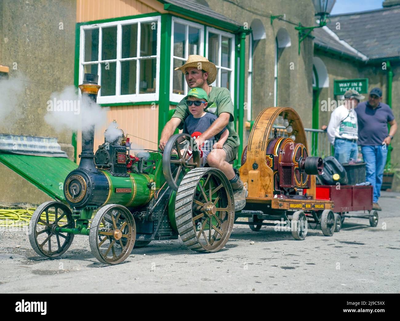 Alf Howick with his son Tobias drives his Burrell traction engine called Perseverance during the Vintage Vehicles weekend at the Mid Hants Railway, also known as the Watercress Line in Ropley, Hampshire. Picture date: Sunday May 22, 2022. Stock Photo