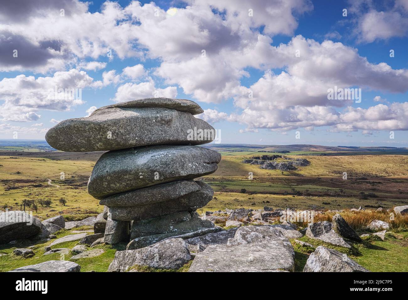 The Cheesewring which is a rock stack left by glacial action on the summit of Stowes Hill on Bodmin Moor in Cornwall. Stock Photo