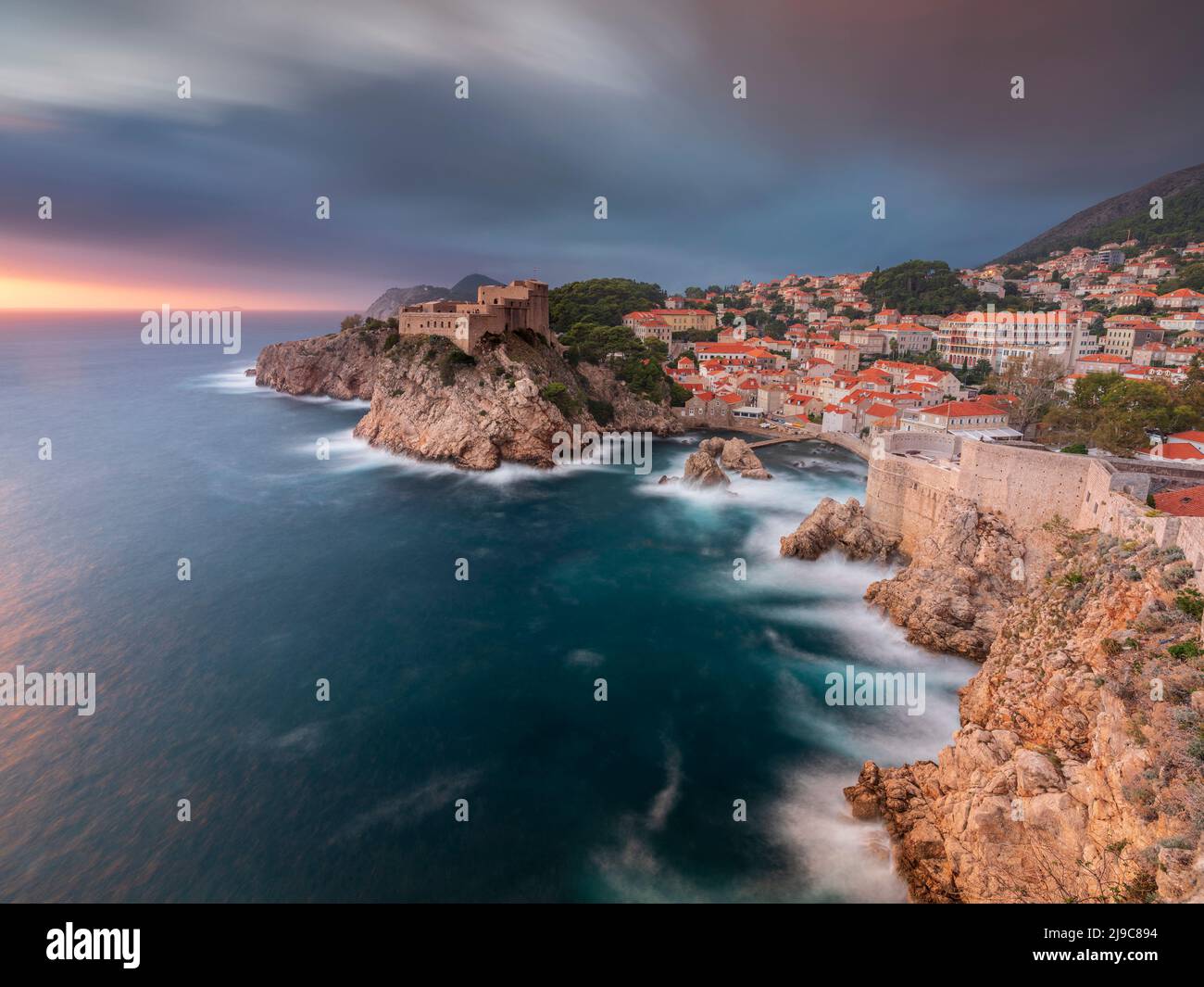 A view over Dubrovnik from the city wall at sunset. Stock Photo