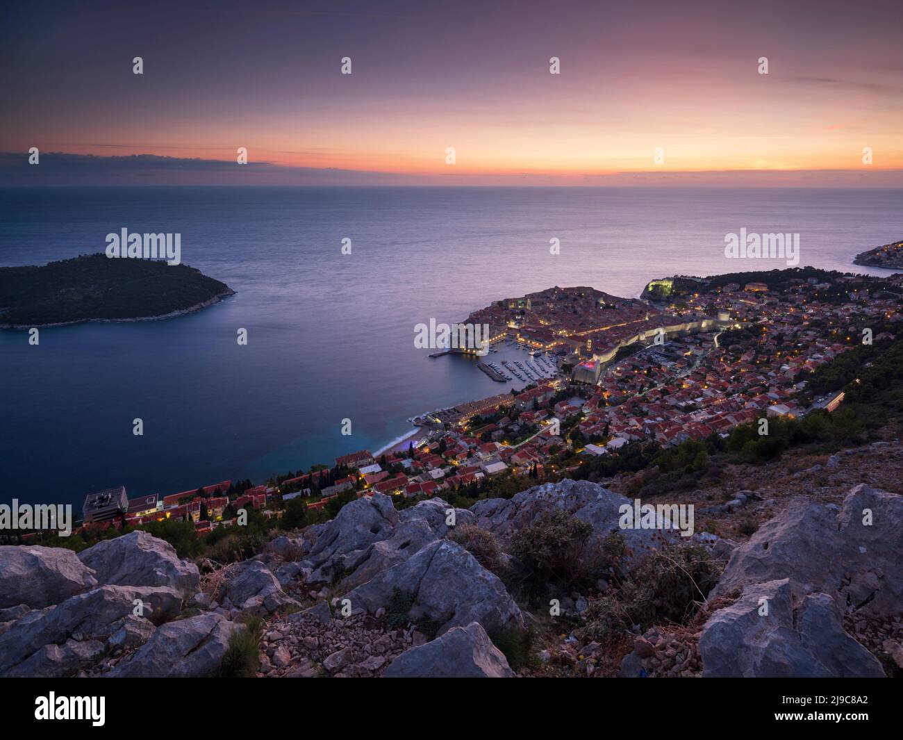 A view over Dubrovnik Old Town at dusk. Stock Photo