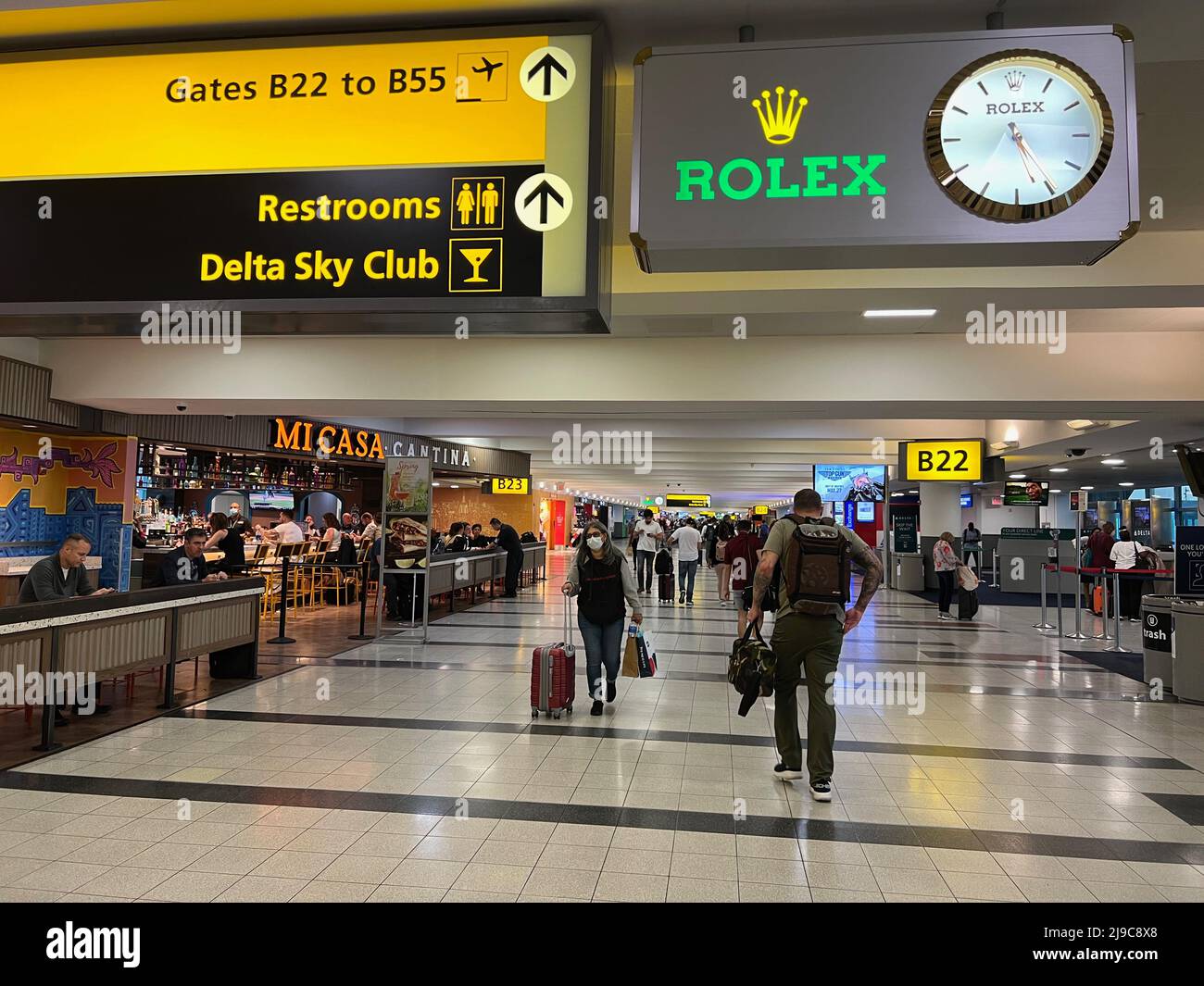 Passengers walk through Terminal 4 at JFK Airport in New York on May 20