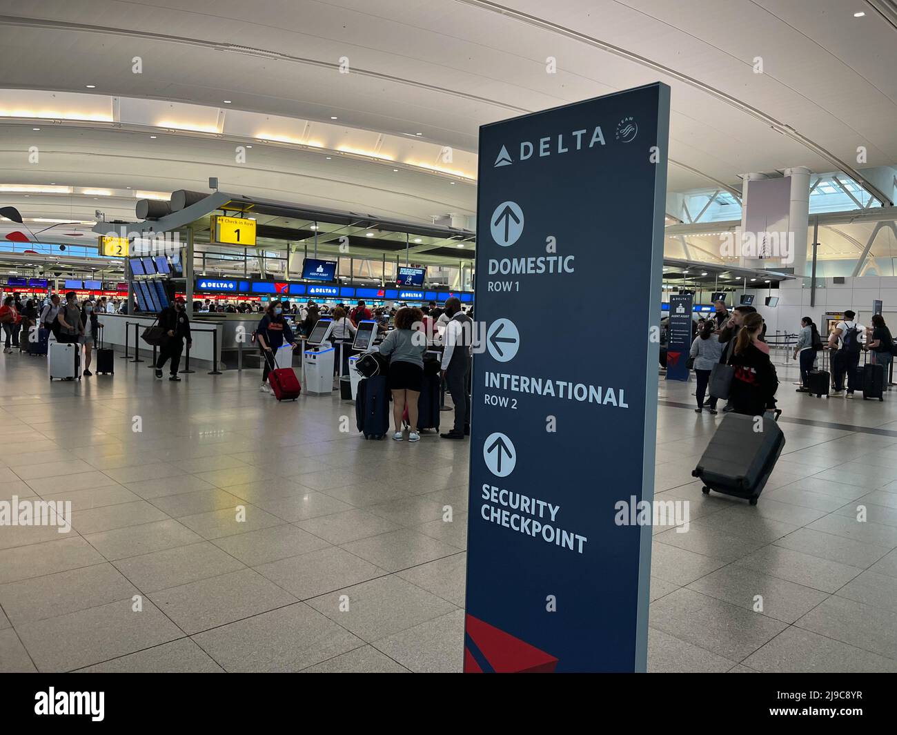 New York, United States. 20th May, 2022. Passengers walk through