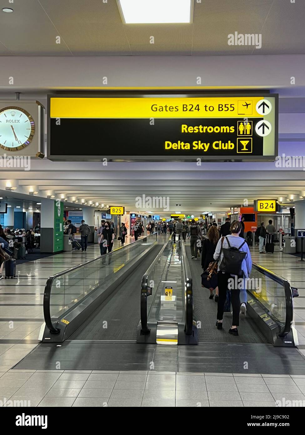 New York, United States. 20th May, 2022. Passengers walk through