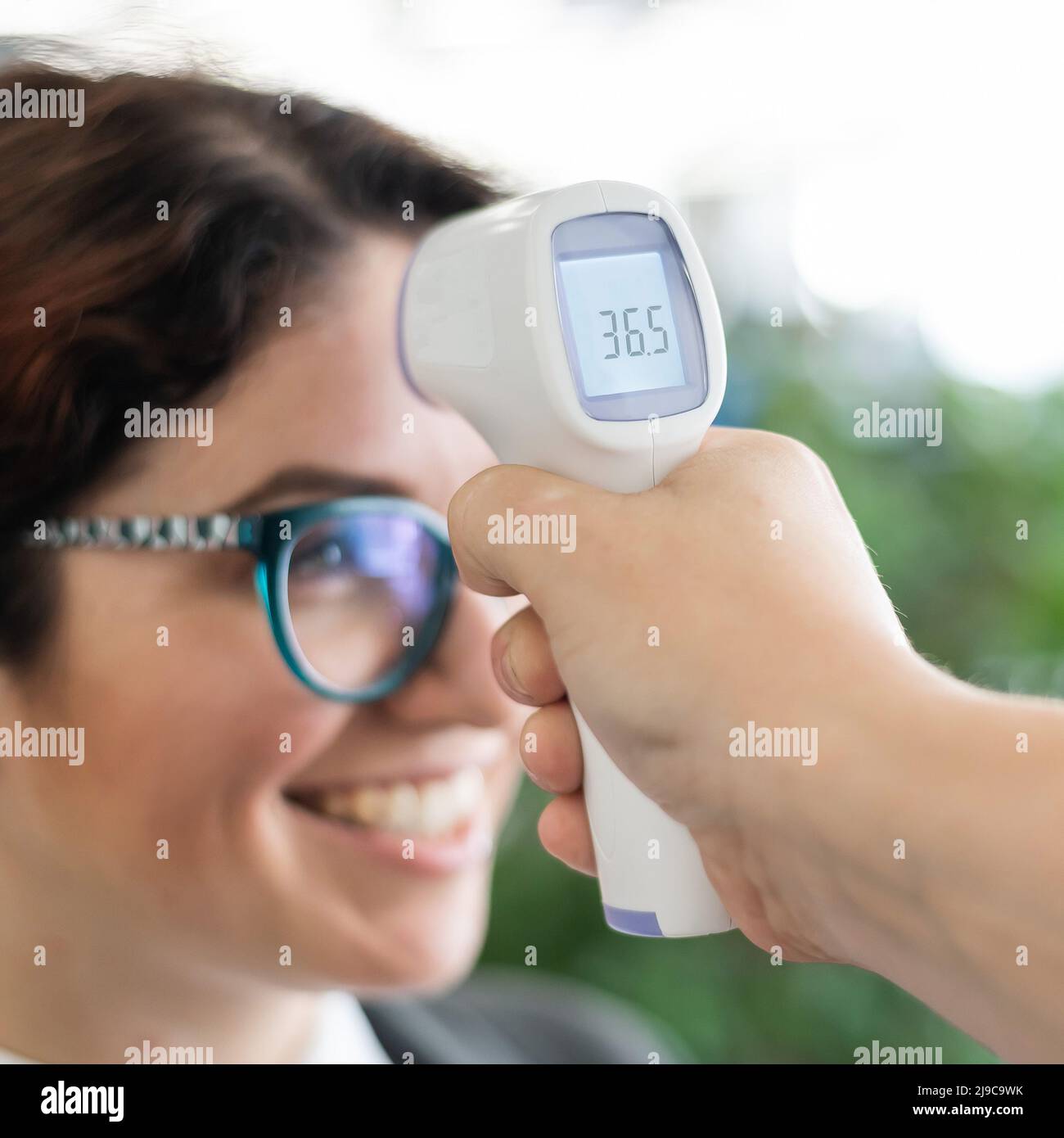 Mandatory measurement of a fever noncontact thermometer gun of all