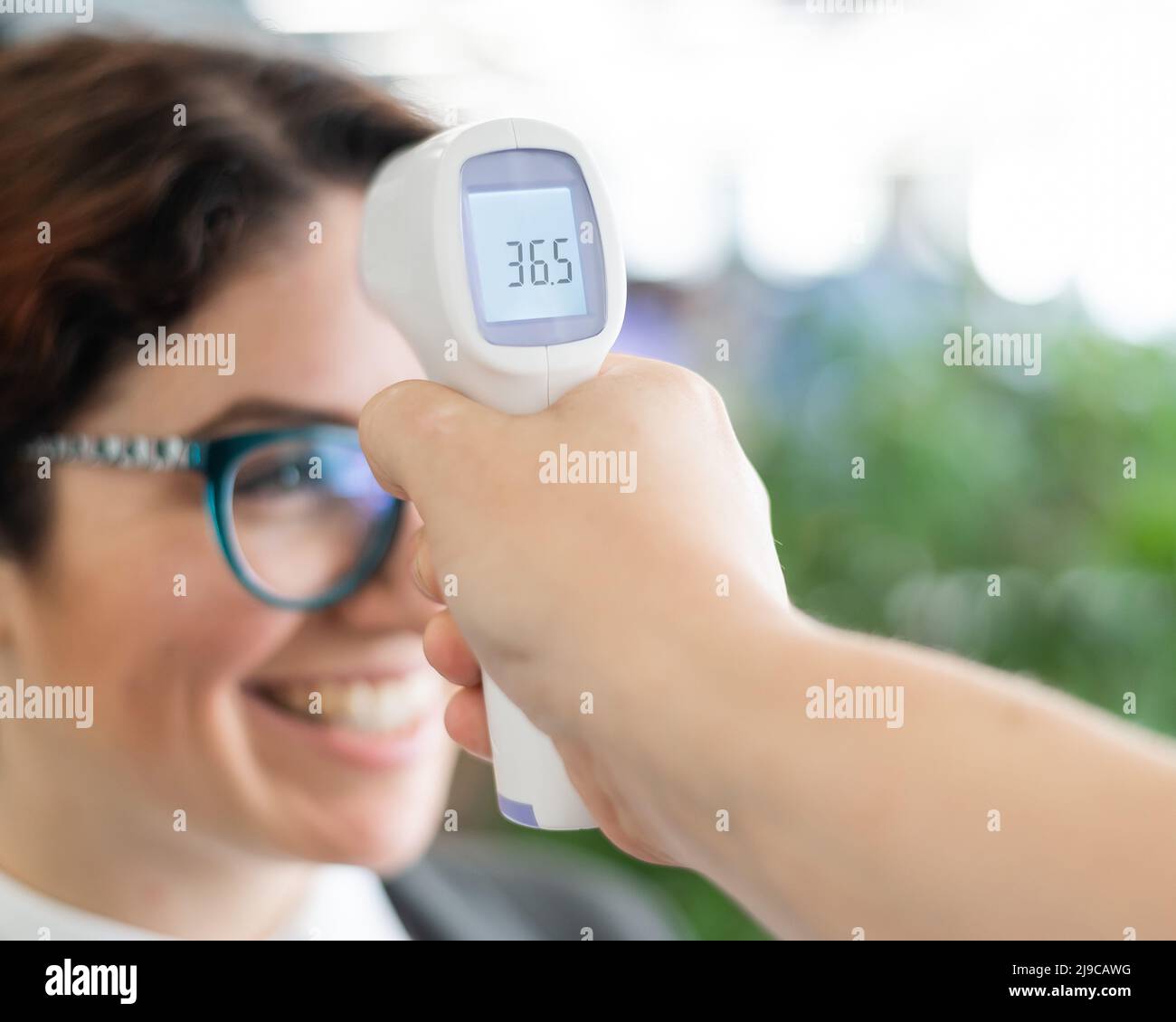 Mandatory measurement of a fever noncontact thermometer gun of all