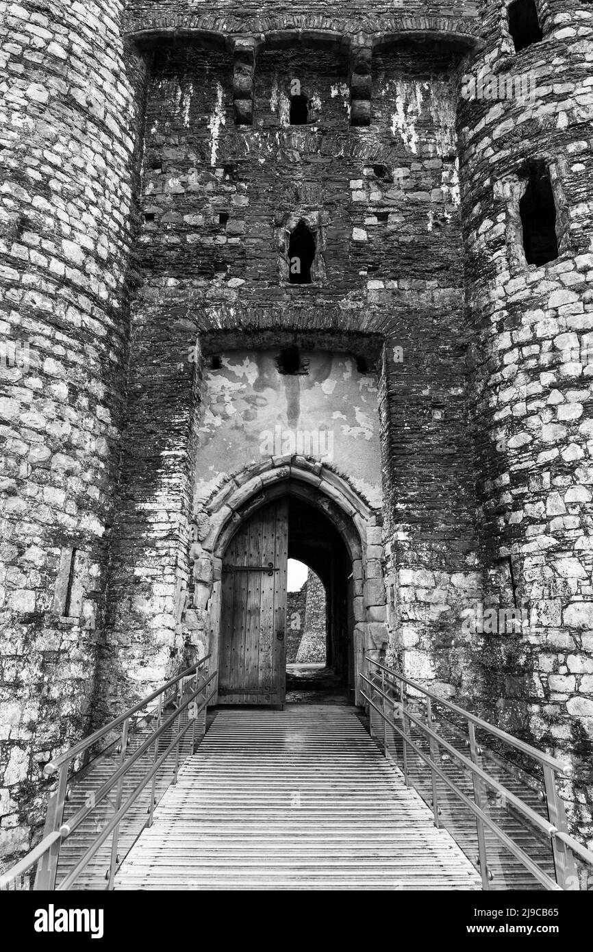 Monochrome image of the gateway in Kidwelly Castle Gatehouse in Kidwelly, Carmarthen, Wales, UK Stock Photo