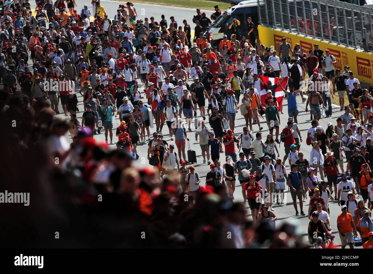 Circuit atmosphere - fans invade the circuit to head to the podium at the end of the race. Spanish Grand Prix, Sunday 22nd May 2022. Barcelona, Spain. Stock Photo