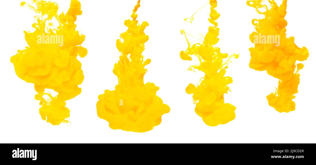 Yellow ink in water on white background Stock Photo Alamy