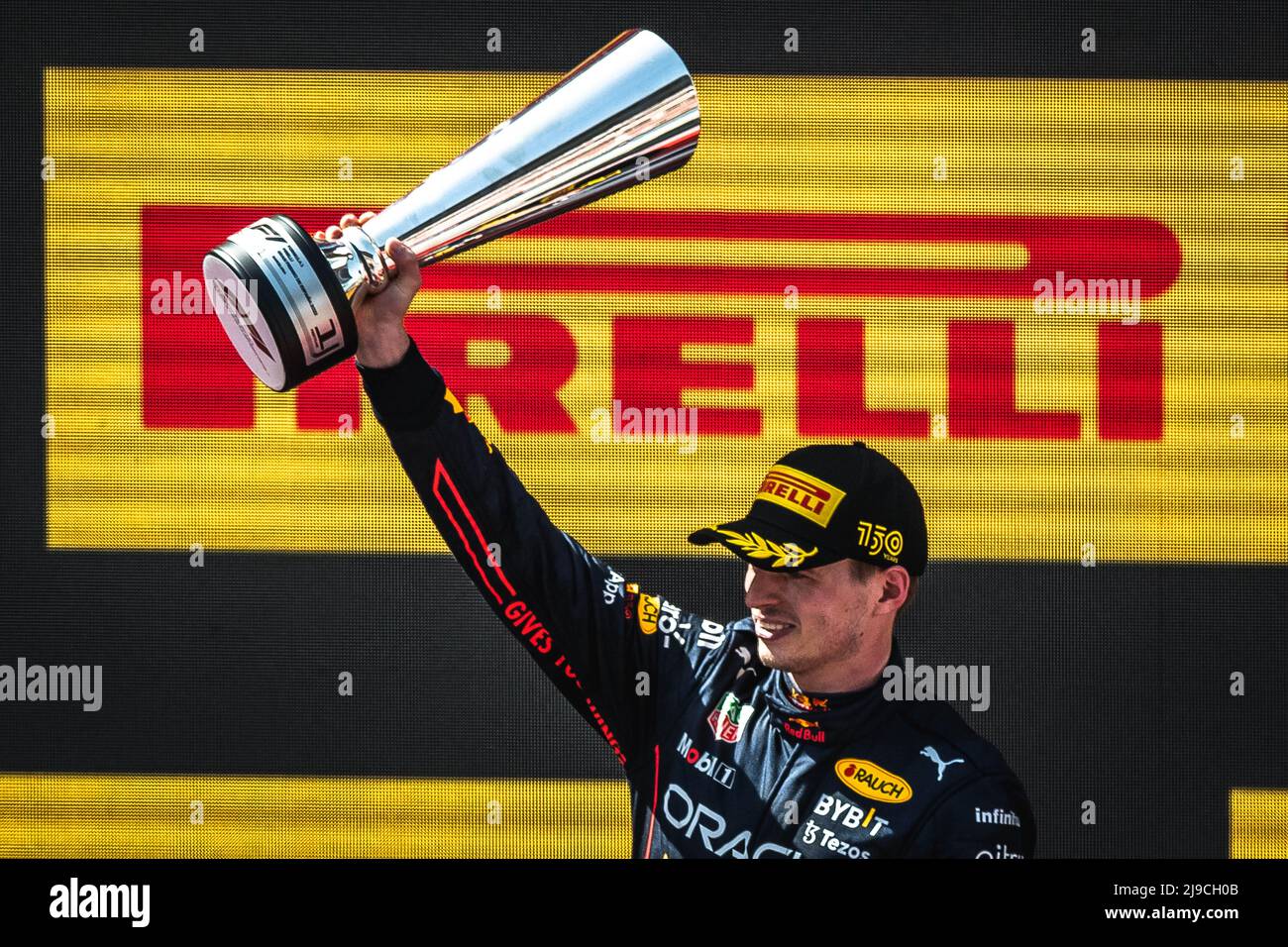 Barcelona, Spain. 22nd May, 2022. MAX VERSTAPPEN (NED) from team Red Bull celebrates his victory of the Spanish GP presenting his cup on the podium at Circuit de Barcelona Catalunya Credit: Matthias Oesterle/Alamy Live News Stock Photo
