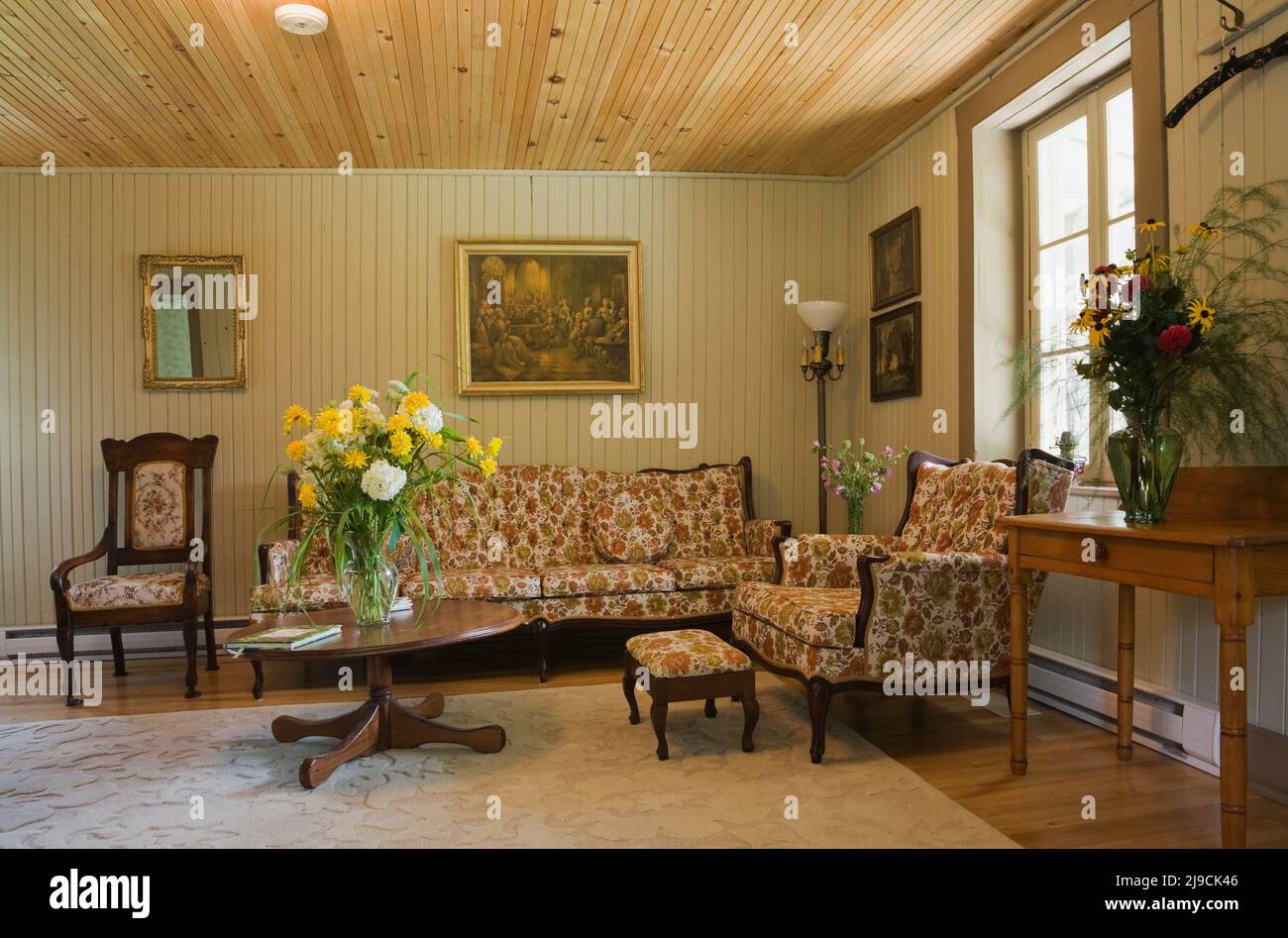 Antique coffee table, sofa, armchair with flowery patterns and ...
