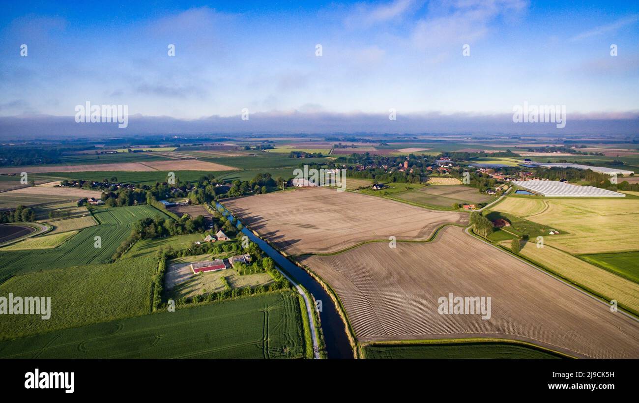 Drone aerial shot of typical dutch villages in Groningen, the Netherlands Stock Photo