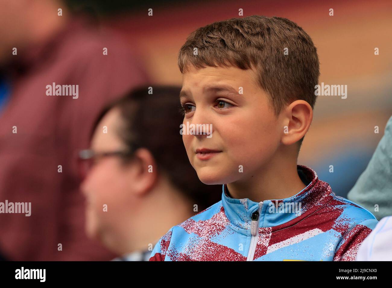 Young Burnley fan contemplates relegation Stock Photo