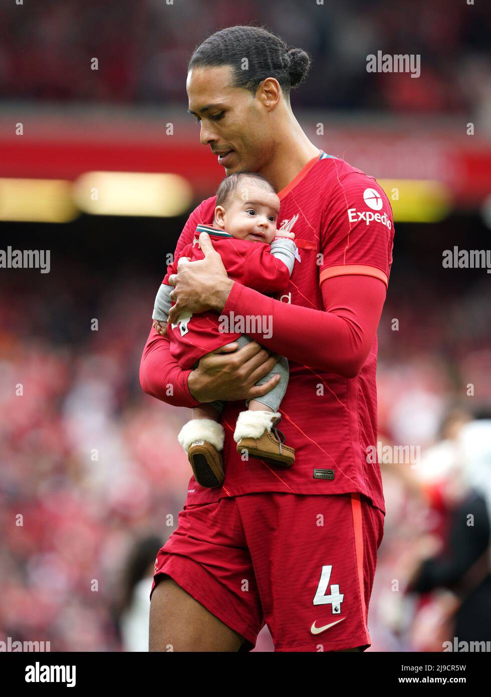Liverpool's Virgil van Dijk walks the pitch after the Premier League