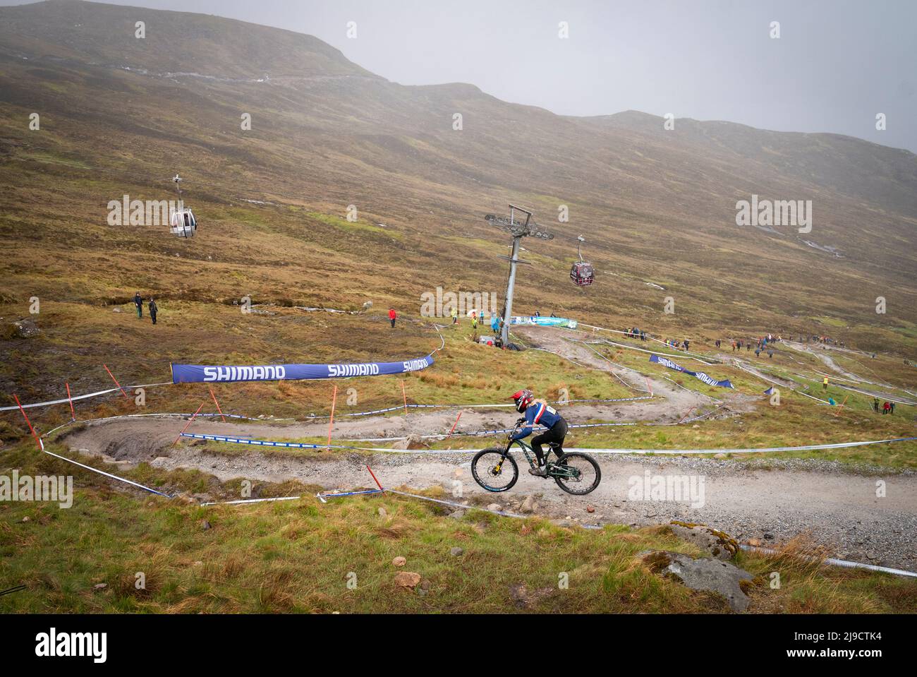 Competitors on the top section of the course on Aonach Mor during day two of the Mercedes-Benz UCI MTB World Cup event in Fort William. Picture date: Sunday May 22, 2022. Stock Photo