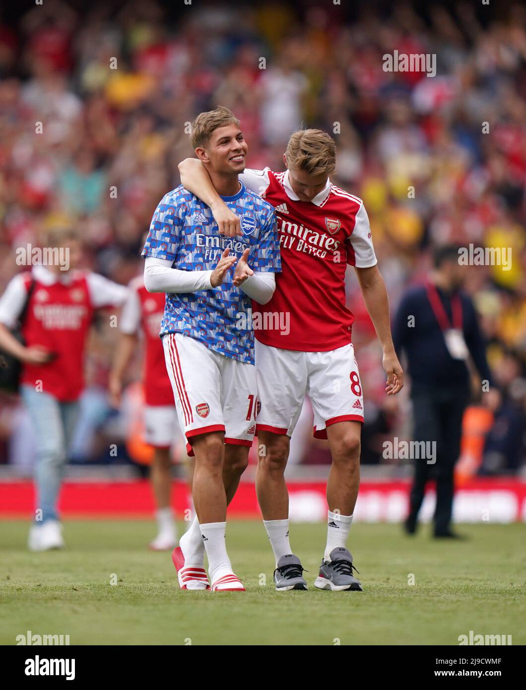 Arsenal's Emile Smith Rowe And Martin Odegaard React Following During 