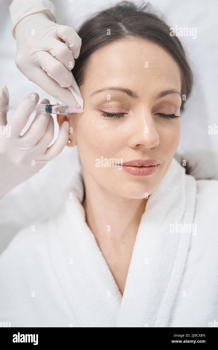 Caucasian woman receiving esthetician facial hi-res stock photography ...