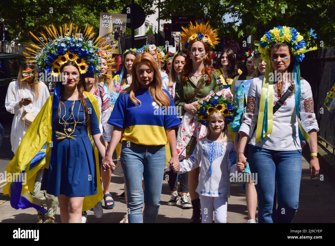 London, England, UK. 22nd May, 2022. Ukrainian singer and television presenter TINA KAROL marches with protesters wearing traditional flower headdresses. Crowds marched from Hyde Park to the Russian Embassy in London calling on the international community to help save the children in Ukraine and in protest against the atrocities reportedly committed by Russian forces. (Credit Image: © Vuk Valcic/ZUMA Press Wire) Stock Photo