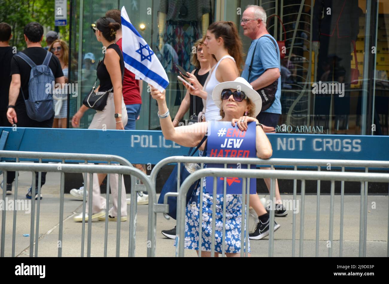Spectator i seen holding Israeli flag to celebrate the annual Israel