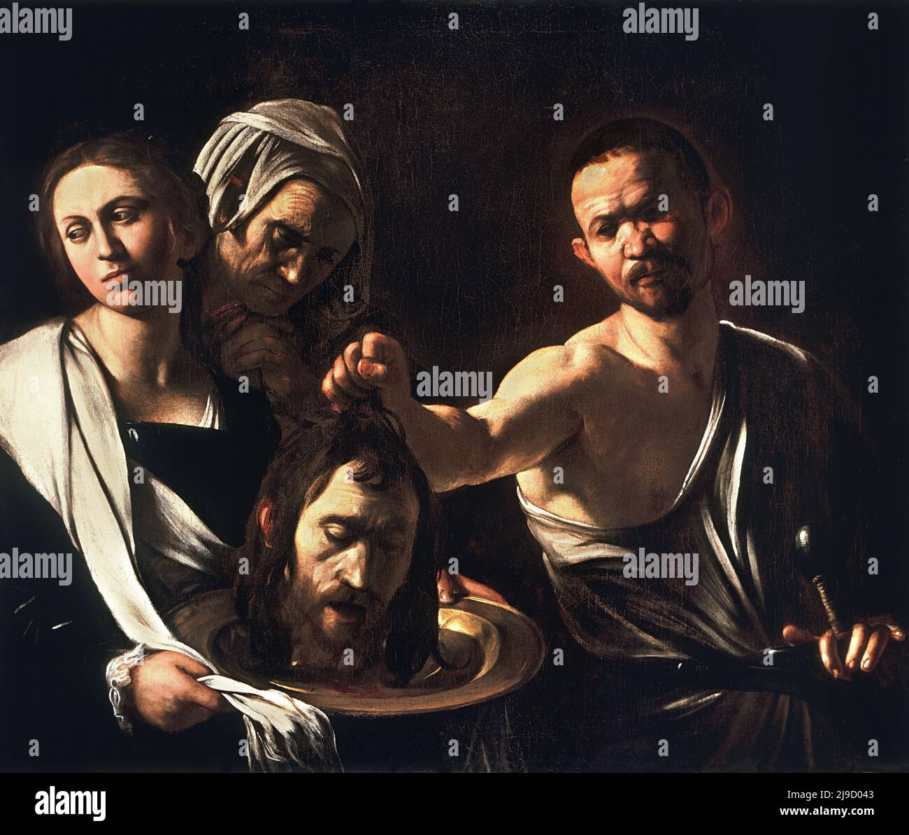 Salome with the head of John the Baptist painted by Caravaggio Stock Photo