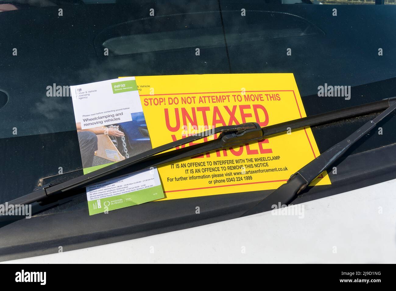 Warminster, Wiltshire, UK - May 17 2022: An Untaxed Vehicle Notice on the windscreen of a vehicle Stock Photo