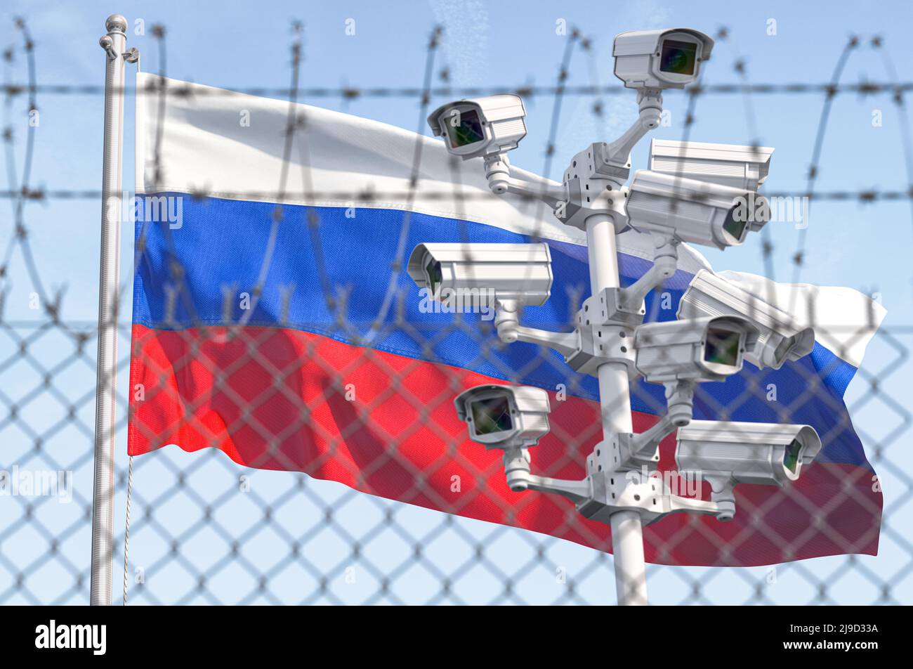 Flag of Russia behind barbed wire fence and cctv cameras. Concept of sanctions, dictatorship, discrimination and violation of human rights and freedom Stock Photo