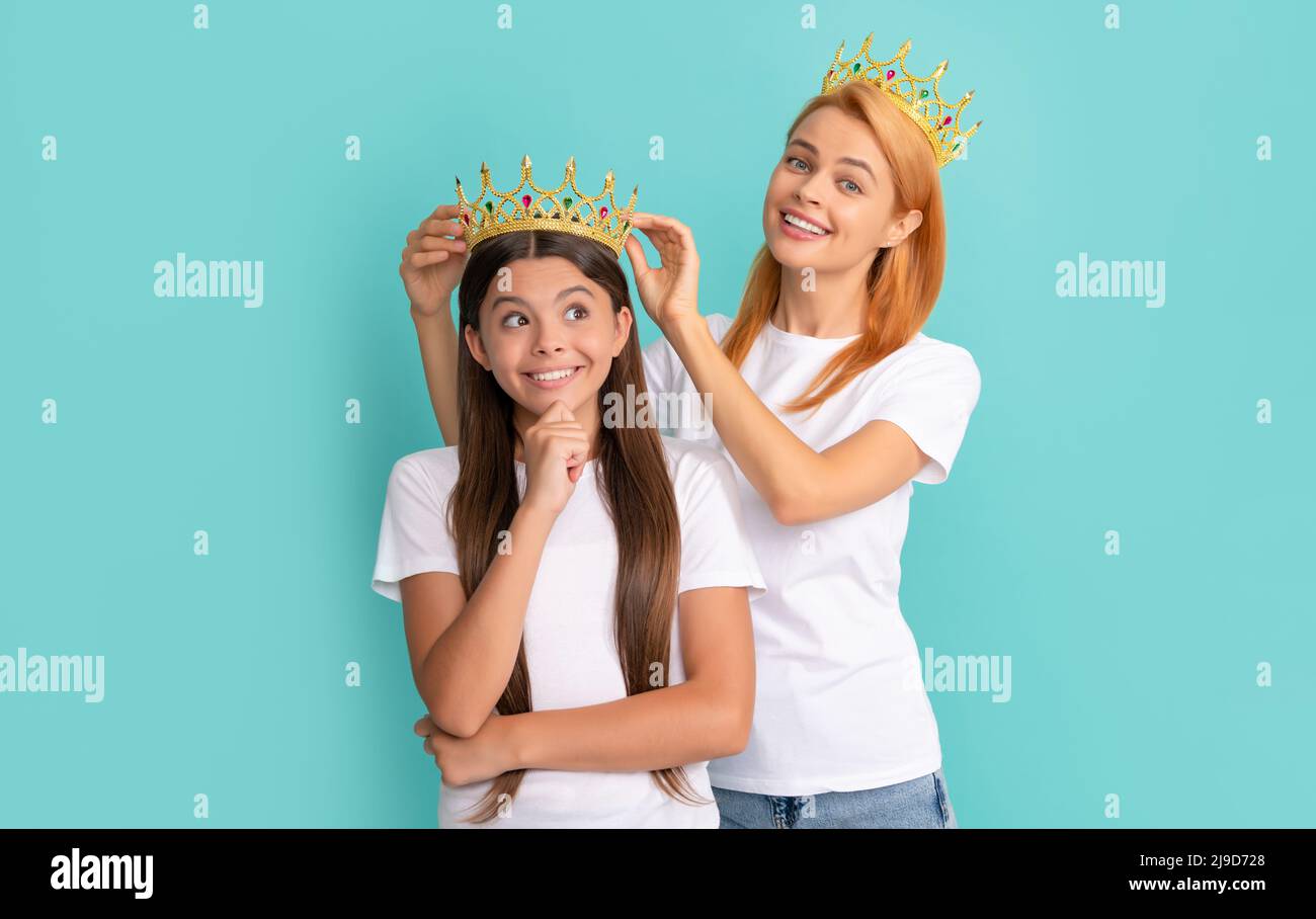 Beauty queen woman crown happy pageant girl child blue background, princess Stock Photo