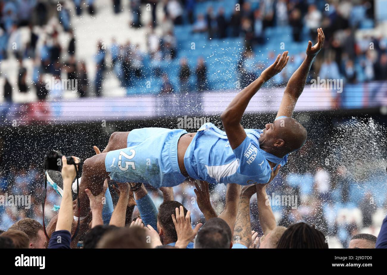 Manchester, UK. 22nd May, 2022. Fernandinho of Manchester City is lifter up by staff and players as he leaves the the club after nine years during the Premier League match at the Etihad Stadium, Manchester. Picture credit should read: Darren Staples/Sportimage Credit: Sportimage/Alamy Live News Stock Photo
