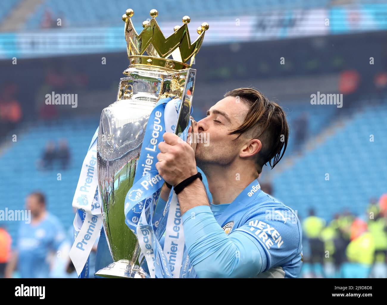 Manchester, UK. 22nd May, 2022. Jack Grealish of Manchester City kisses the Premier League Trophy during the Premier League match at the Etihad Stadium, Manchester. Picture credit should read: Darren Staples/Sportimage Credit: Sportimage/Alamy Live News Stock Photo