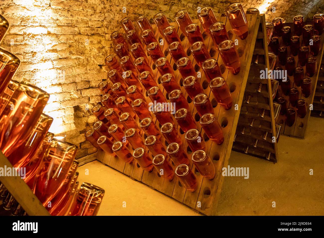 Sparkling dry rose wine production by traditional method in underground