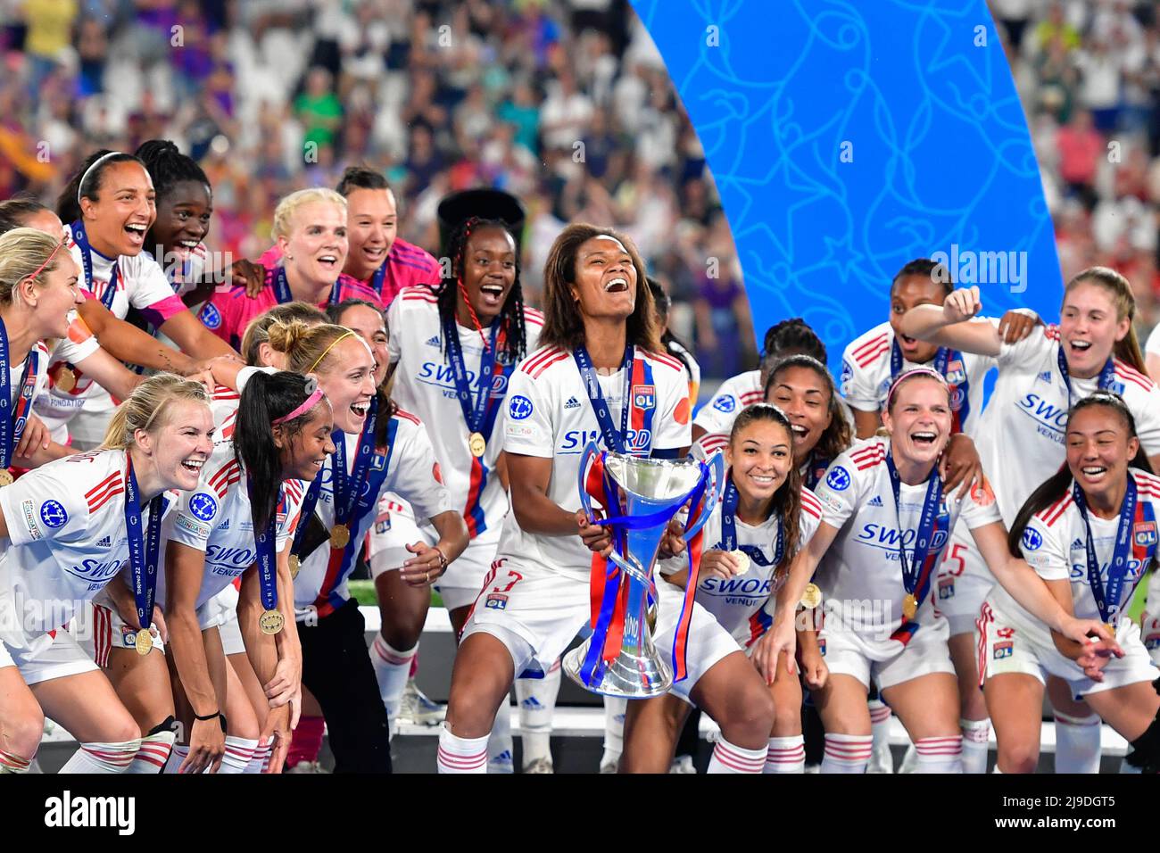 Turin, Italy. 21st, May 2022. Captain Wendie Renard (3) and the team of Olympique Lyon can raise the trophy in joy after winning UEFA Women’s Champions League final between Barcelona and Olympique Lyon at Juventus Stadium in Turin. (Photo credit: Gonzales Photo - Tommaso Fimiano). Stock Photo
