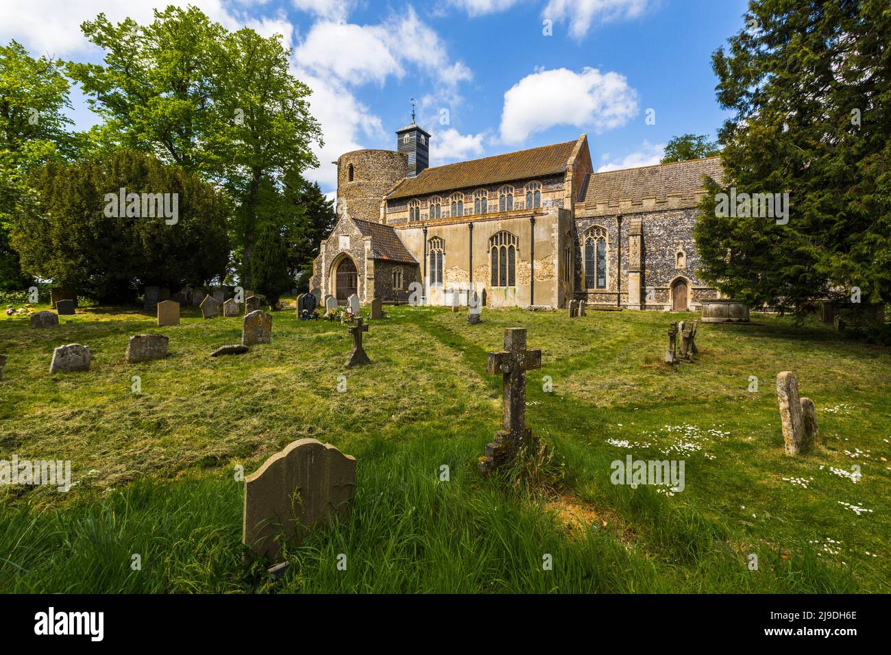 The Church of St Mary the Virgin is the church with the biggest round tower in England. Wortham, Suffolk, East Anglia, UK. Stock Photo