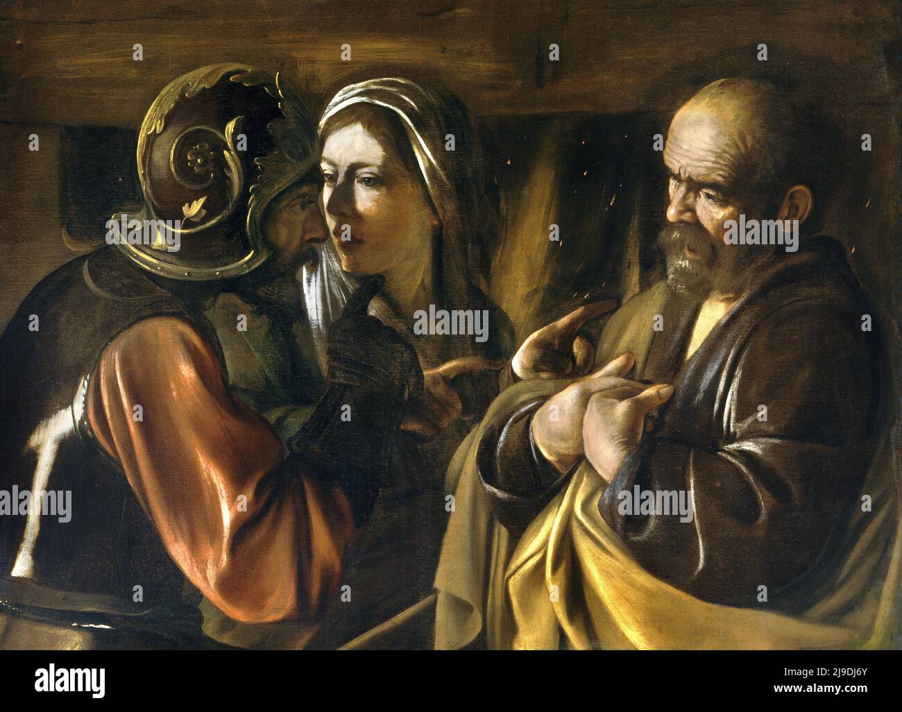 The Denial of Saint Peter painted by Caravaggio. This painting depicts the scene where, after the arrest of Jesus, St Peter denies knowing him when being confonted by the by the authorities. Stock Photo