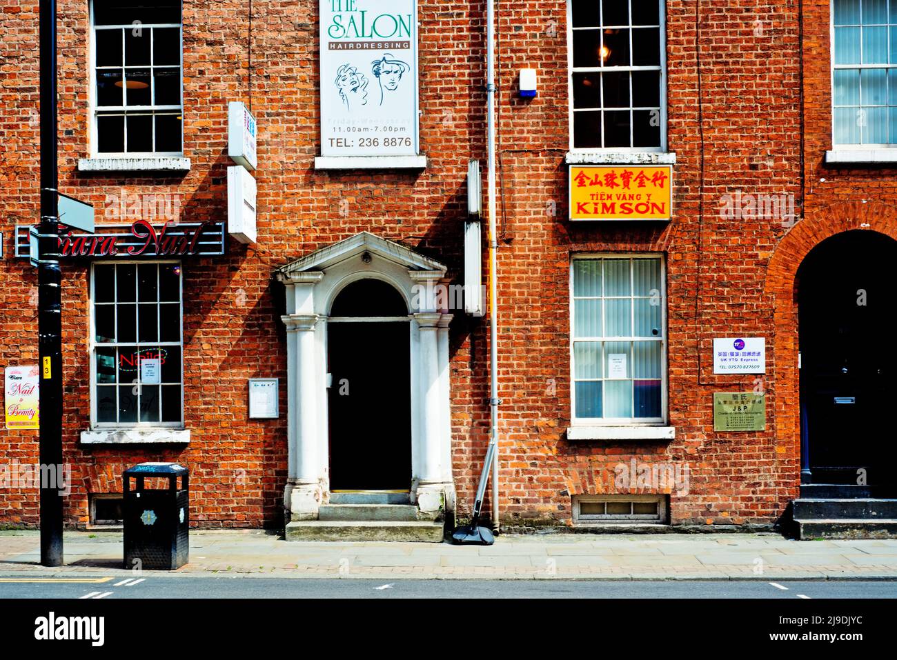 Beauty and hairdressing salons, Princess Street, Manchester, England Stock Photo