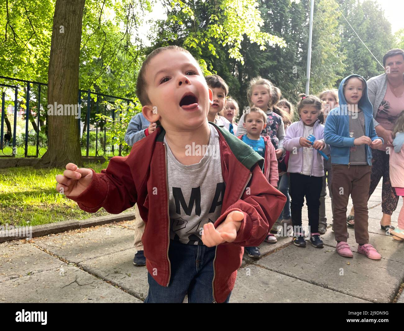 Lviv, Ukraine. 16th May, 2022. A rambunctious Ukrainian orphan boy