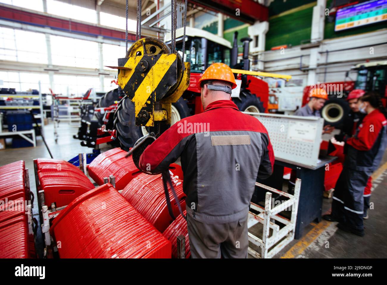 The process of assembling agricultural tractors and harvesters Stock