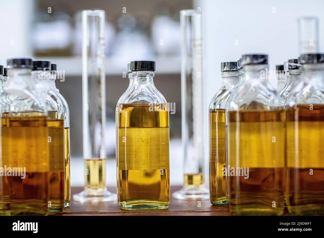 whisky blending measure and sampling bottles on display. Stock Photo