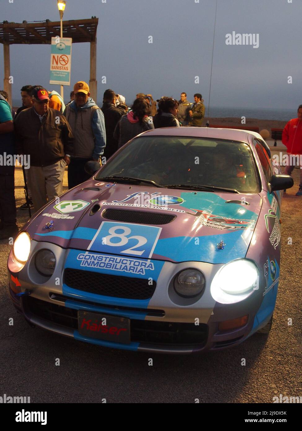 Car racing at the starting line and promotional Super Prime of the