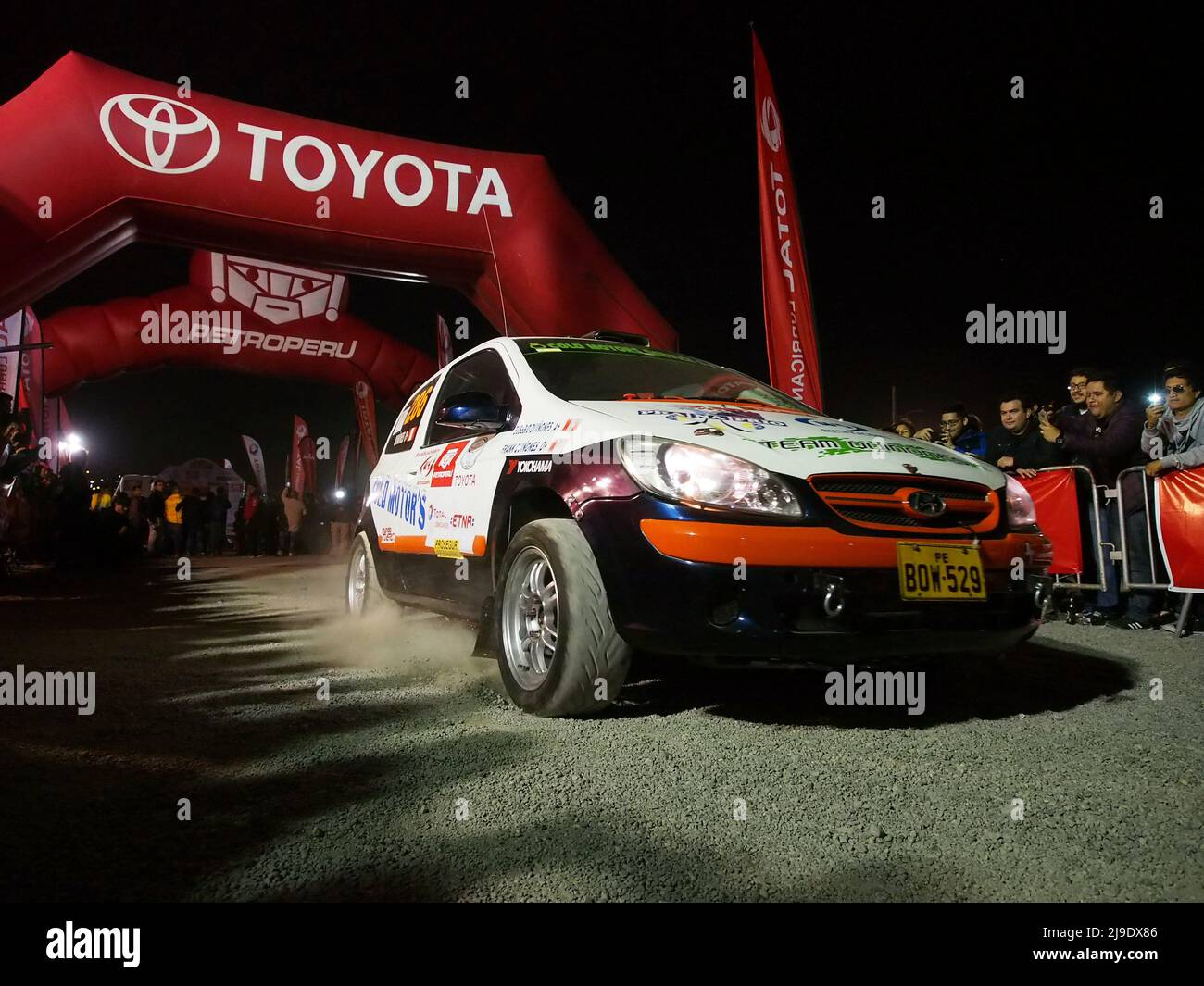 Car racing at the starting line and promotional Super Prime of the