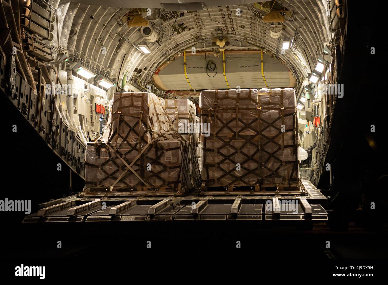 Ramstein Air Base, Germany. 22nd May, 2022. A C-17 Globemaster III assigned to Joint Base Pearl Harbor-Hickam, Hawaii, is loaded with 132 pallets of Nestle's Alfamino® Infant and Alfamino® Junior at Ramstein Air Base, Germany, on Sunday, May 22, 2022. Hundreds of boxes of infant formula arrived from Switzerland before being loaded on a C-17 for transport as part of Operation Fly Formula, an operation to quickly import infant formula to the United States that meets U.S. health and safety standards. Photo by Airman 1st Class Jared Lovett/U.S. Air Force/UPI Credit: UPI/Alamy Live News Stock Photo