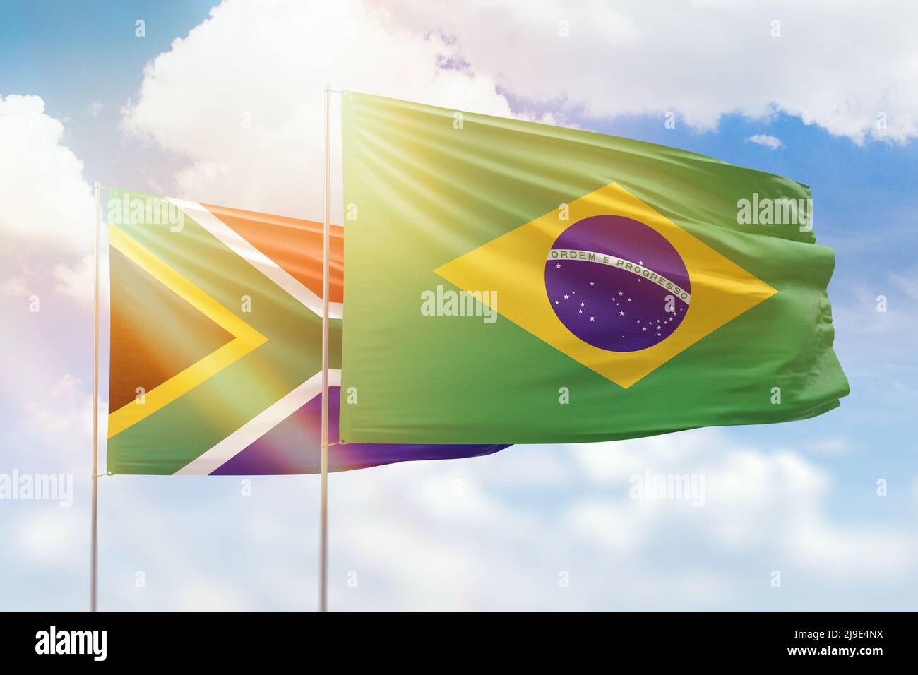 Sunny blue sky and flags of brazil and south africa Stock Photo - Alamy
