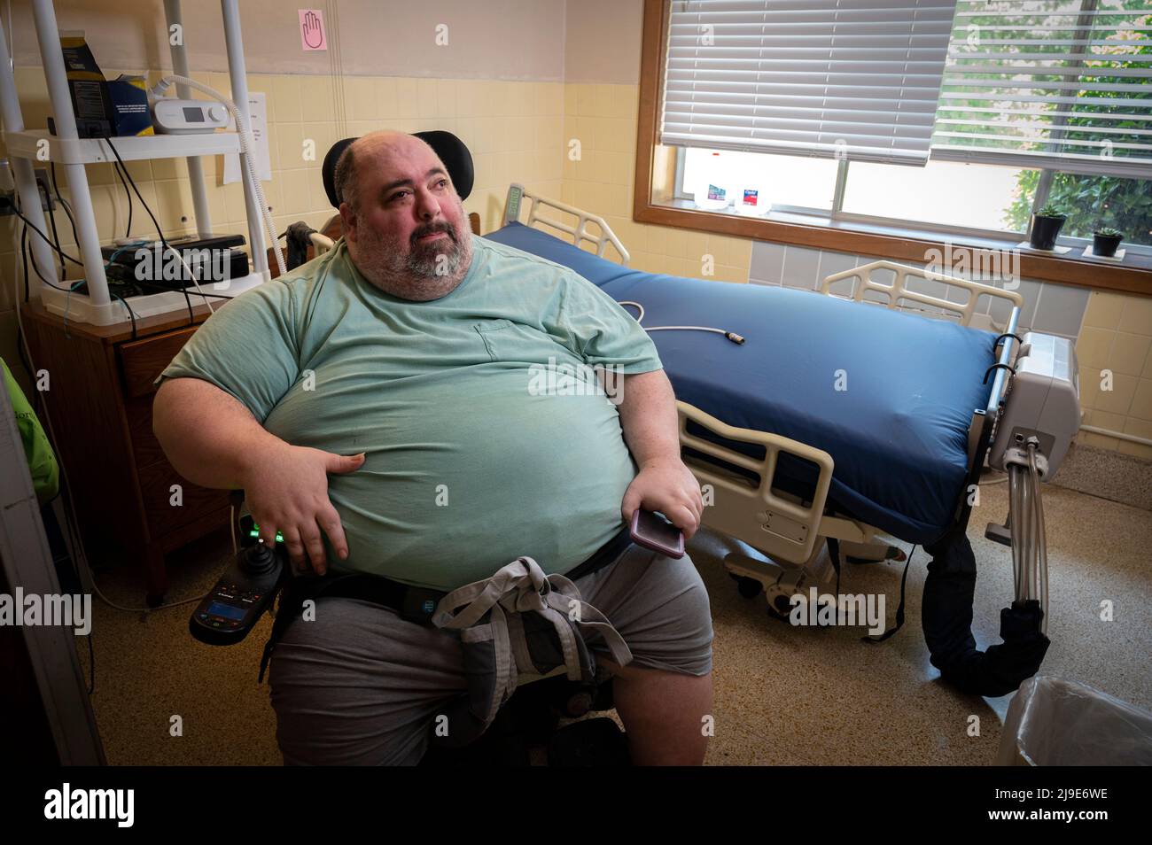 May 22, 2022, Royston, Georgia, USA: Nick Papadolpoulos is a 40-year-old man with cerebral palsy, which has led to severe arthritis and obesity. Heâ€™s been living in a skilled care facility for the past 7 years, waiting for a Medicaid waiver that provides needed supports to live in his own home. He was one of more than 6,000 people with disability on the list for the waiver, but was recently notified that his waiver was approved. An area non-profit that supports individuals with disabilities to live in their own homes and planned to help Papadolpoulos transition to his own home is facing a se Stock Photo